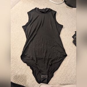 Sleeveless turtleneck bodysuit